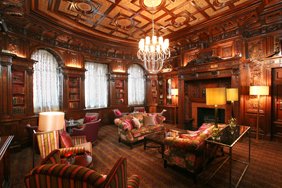 Interior photograph of members room at the Ambassadors Club, Mayfair, London